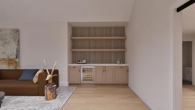 a living room with a couch and a stove top oven