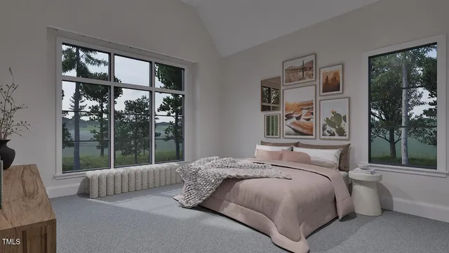 a bedroom with a large bed and a window