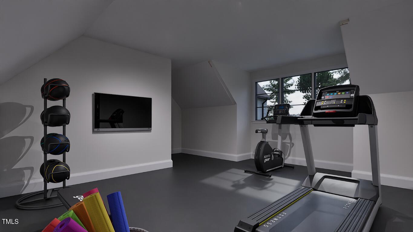 962 Shelley Road Raleigh, NC 27609 - Photo 24 of 34 a living room with furniture and a flat screen tv