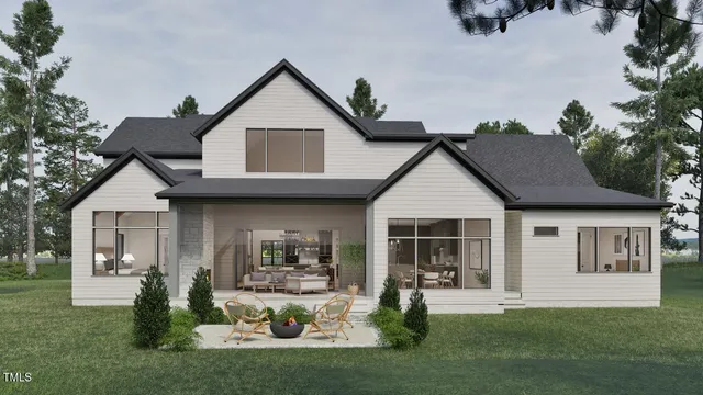 a front view of a house with a yard and porch