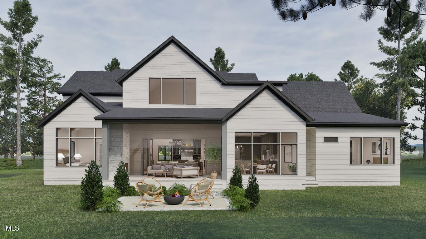 962 Shelley Road Raleigh, NC 27609 - Photo 31 of 34 a front view of a house with a yard and porch