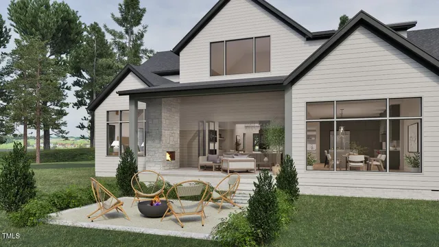 a view of a house with backyard porch and garden
