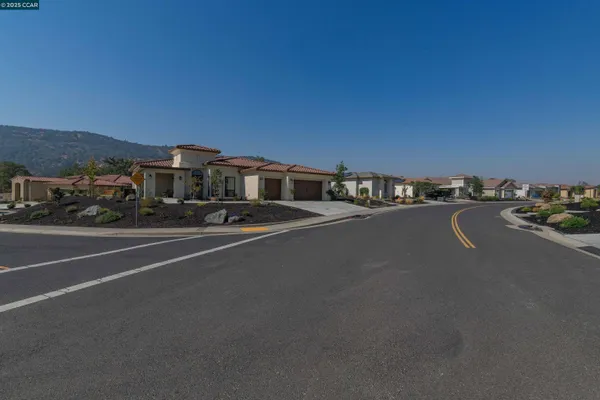a view of a city street with cars