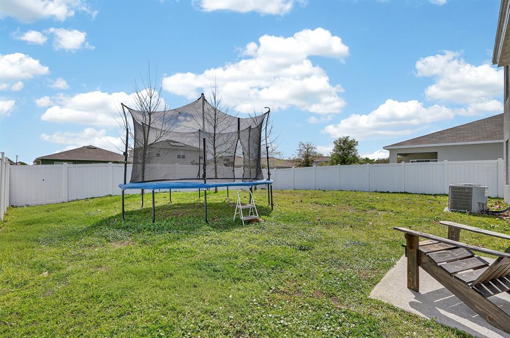 1809 Myrtlebrooke Drive Edgewater, FL 32141 - Photo 35 of 58 a view of a house with a backyard