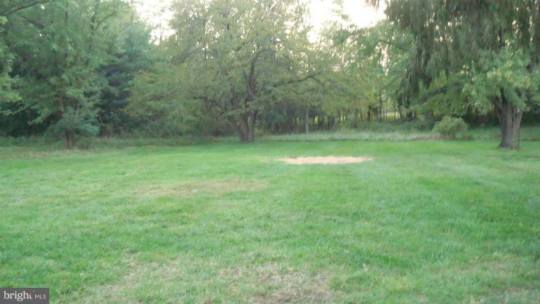 3000 Rolling Rd. Windsor Mill, MD 21244 - Photo 2 of 7 Back yard