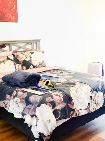 a view of bedroom with furniture