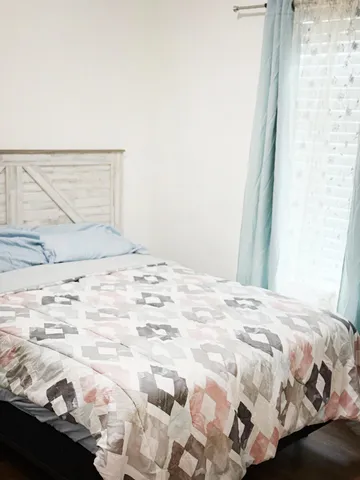 a bedroom with a bed