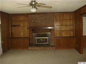 1305 Old Pageland Monroe Road Wingate, NC 28174 - Photo 5 of 5 a room with a fireplace