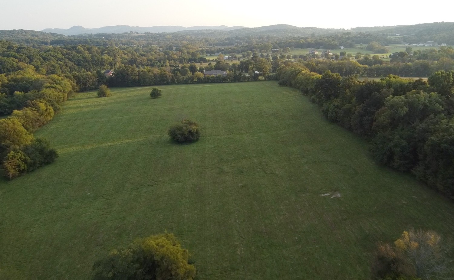 0 Poplar Hill Road Watertown, TN 37184 - Photo 9 of 13 a view of a green field with mountains in the background