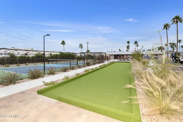 a group of people sitting in roof of a building
