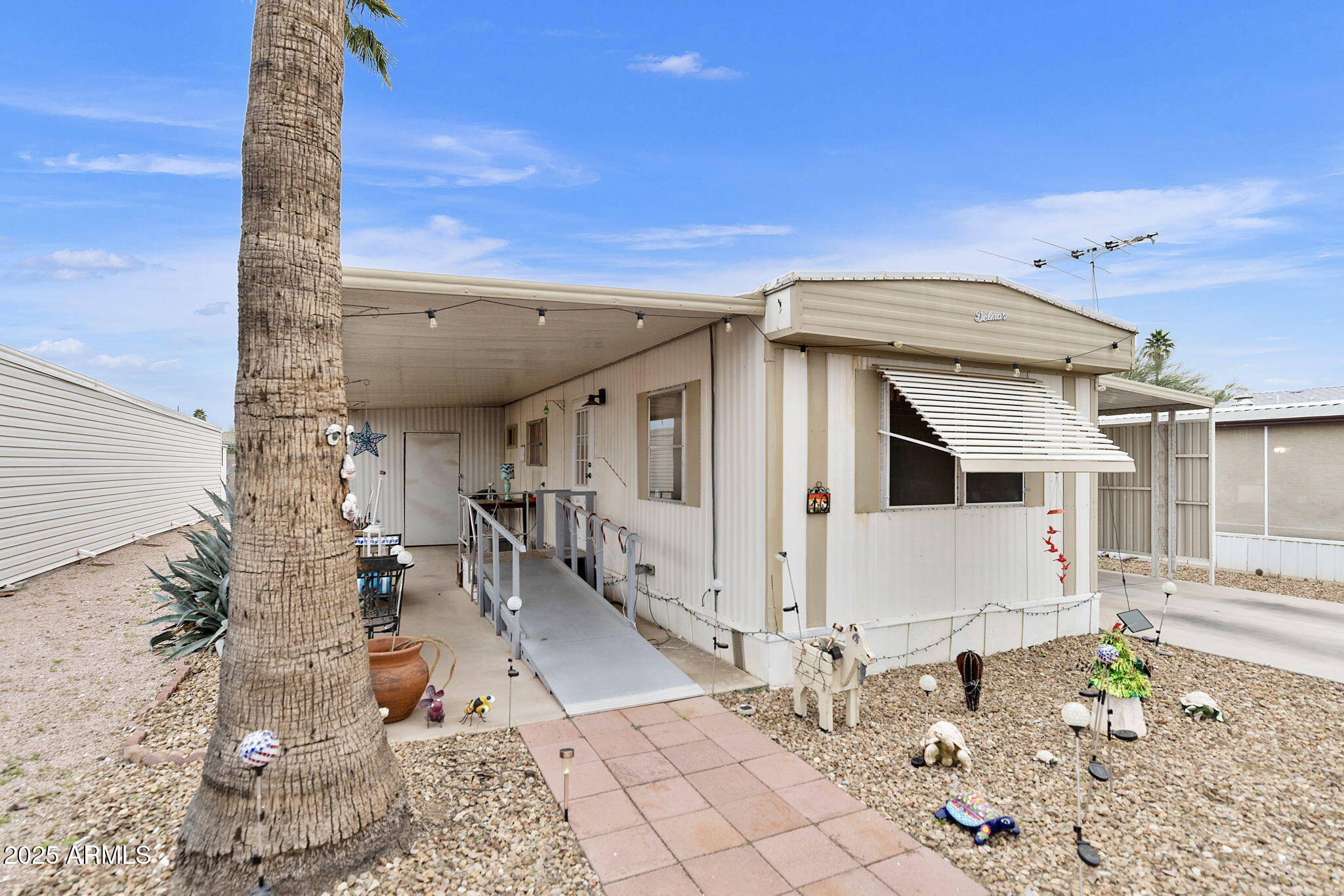 11100 East Apache Trail Apache Junction, AZ 85120 - Photo 2 of 22 a view of a house with a yard