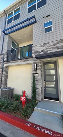 a front view of a house with a garage