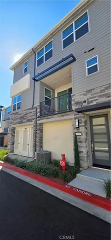 a front view of a house with a garage