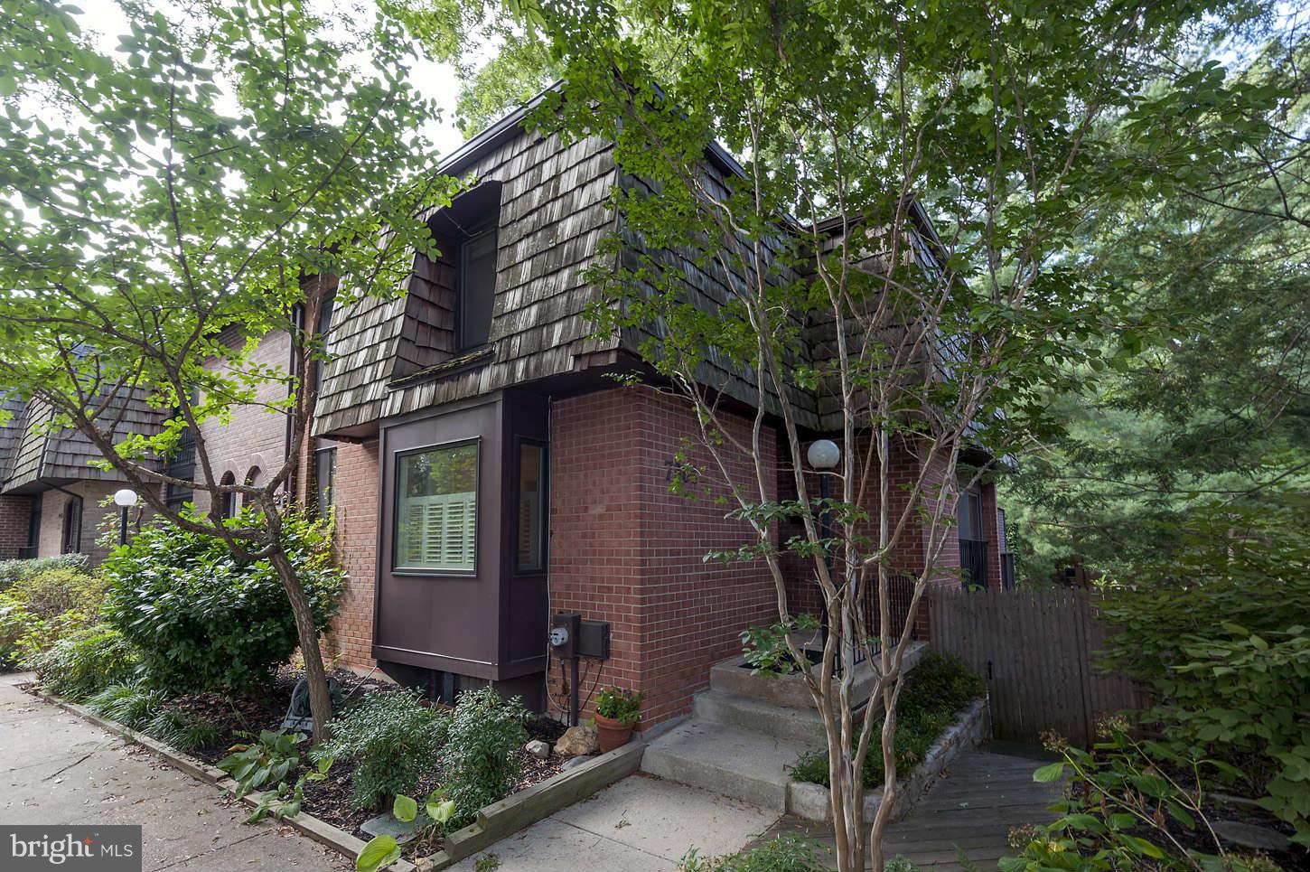 a view of a house with a tree