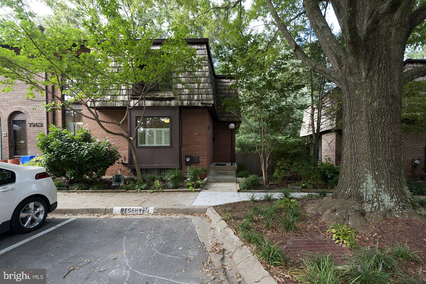 7964 Inverness Ridge Road Potomac, MD 20854 - Photo 2 of 28 a view of a car park in front of a house