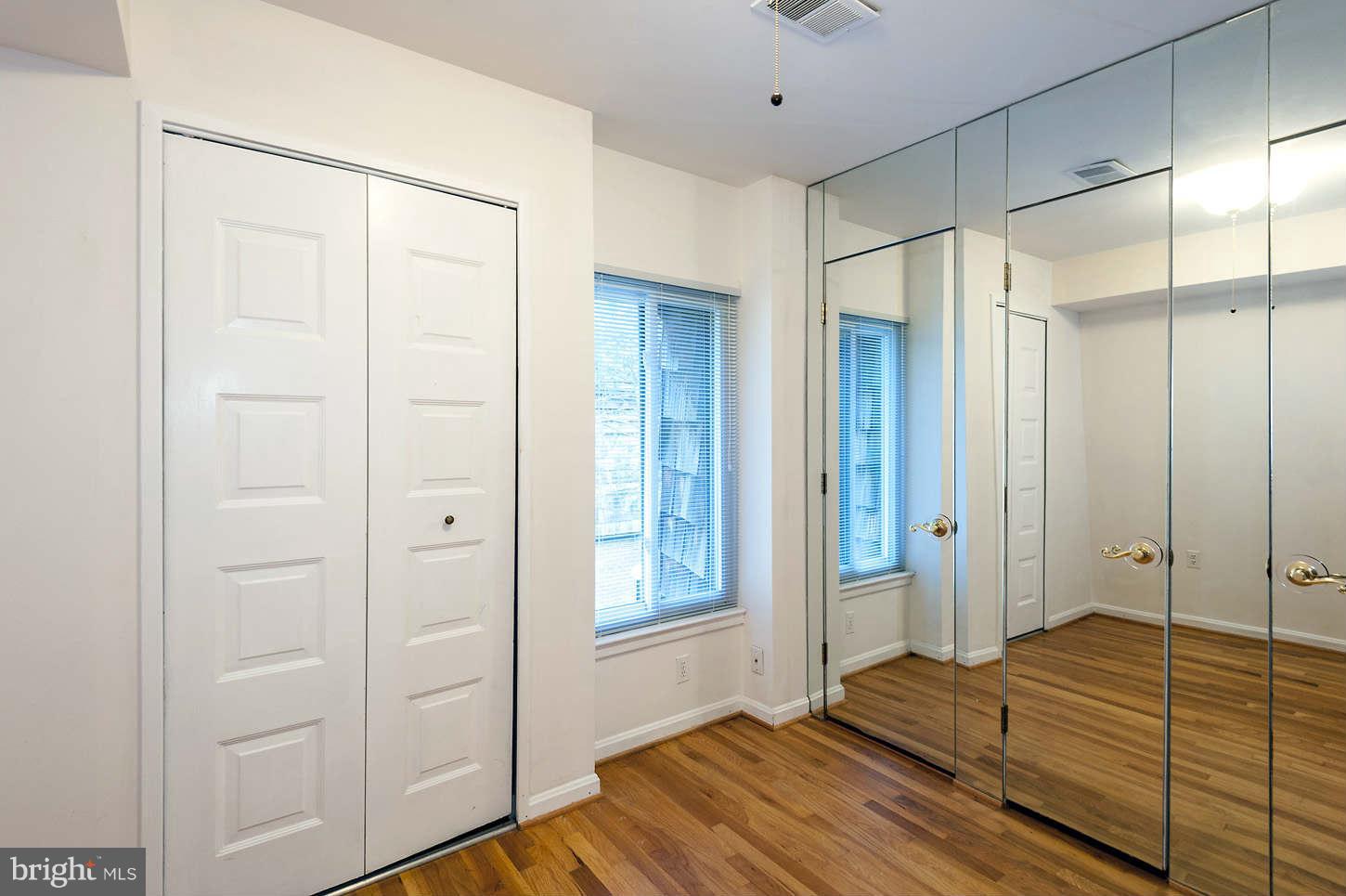 7964 Inverness Ridge Road Potomac, MD 20854 - Photo 24 of 28 a bedroom with a bed and a shower
