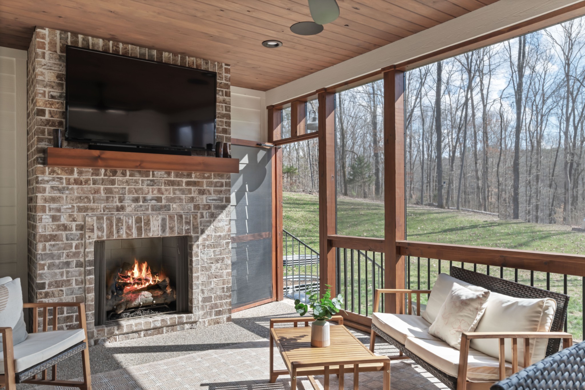 7361 Liberty Road Fairview, TN 37062 - Photo 20 of 71 a living room with furniture and a fireplace