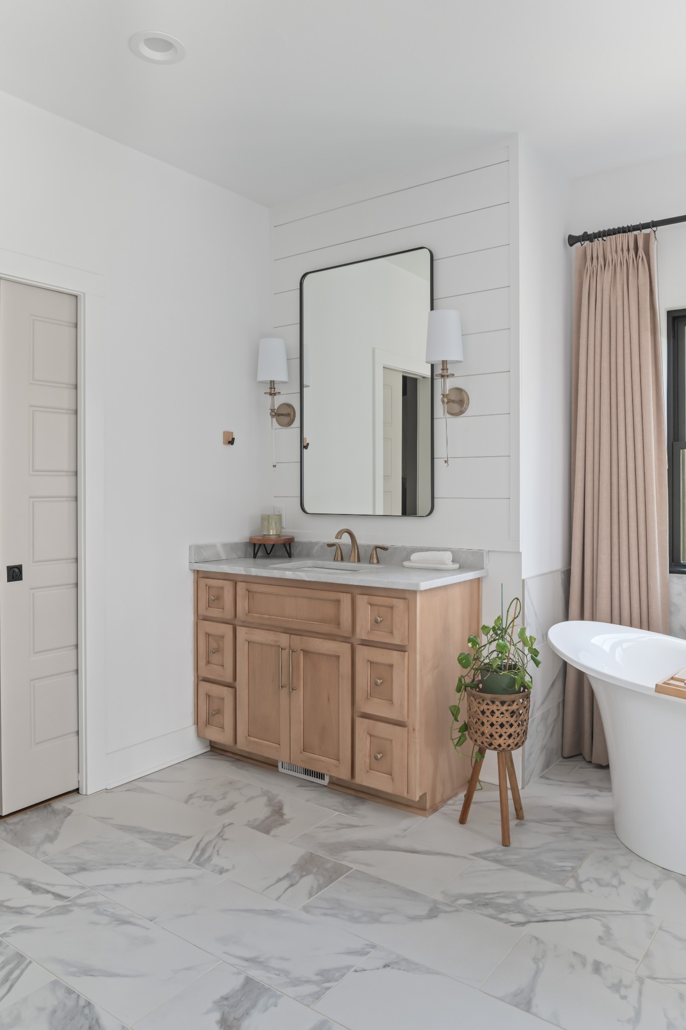 7361 Liberty Road Fairview, TN 37062 - Photo 29 of 71 a spacious bathroom with a granite countertop sink and a mirror