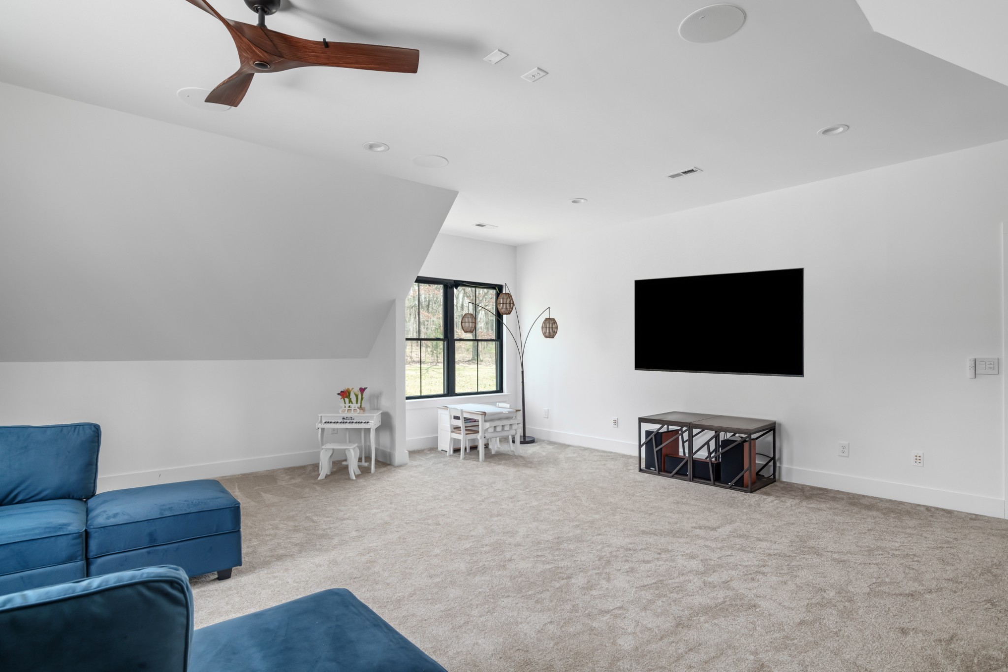 7361 Liberty Road Fairview, TN 37062 - Photo 50 of 71 a living room with furniture and a flat screen tv