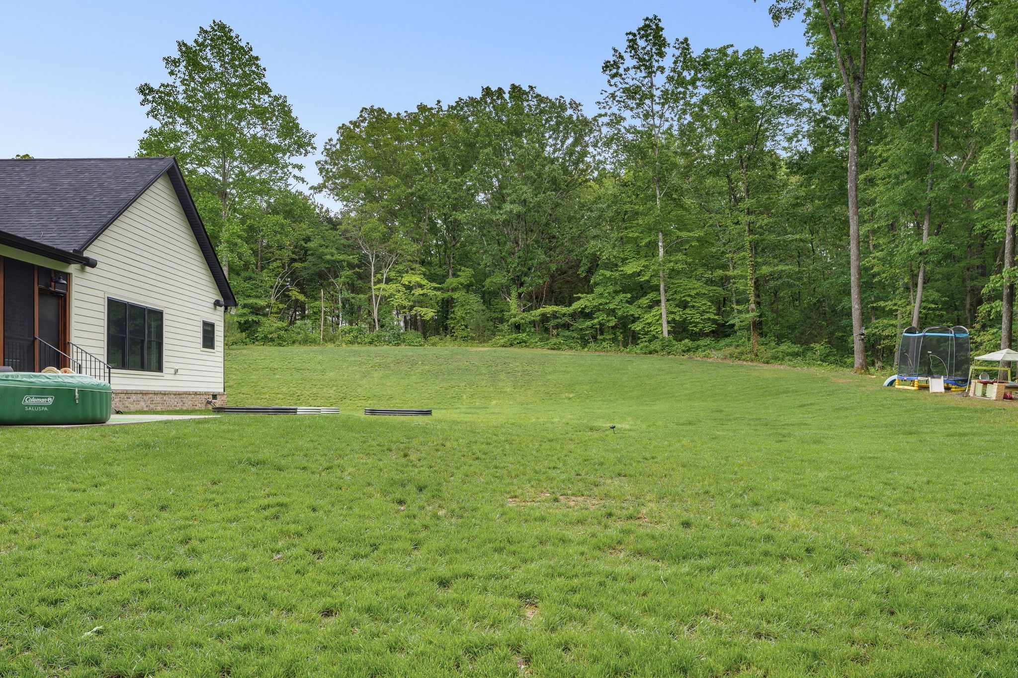 7361 Liberty Road Fairview, TN 37062 - Photo 54 of 71 a view of a backyard with a garden