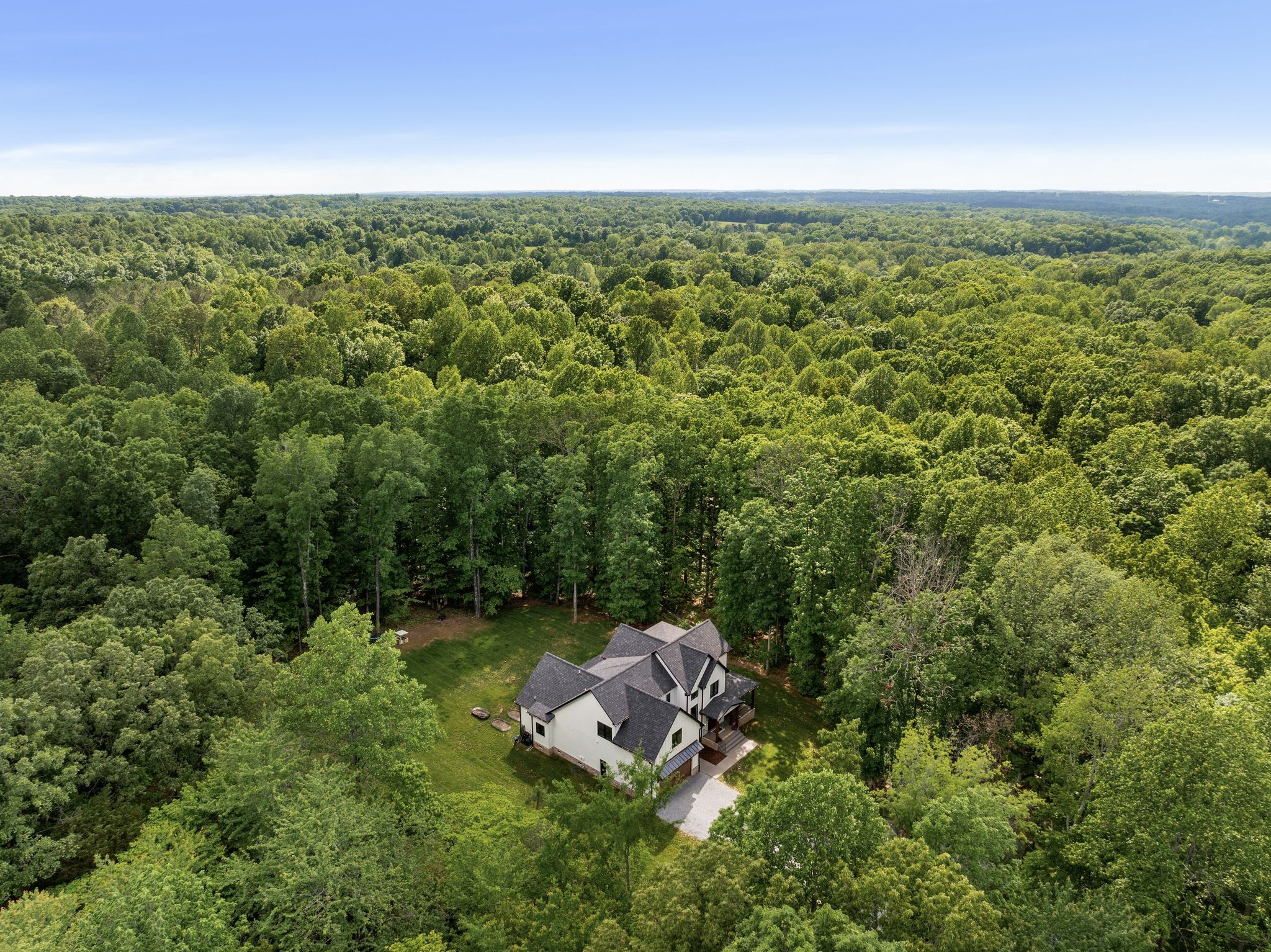 7361 Liberty Road Fairview, TN 37062 - Photo 68 of 71 an aerial view of a house with a yard