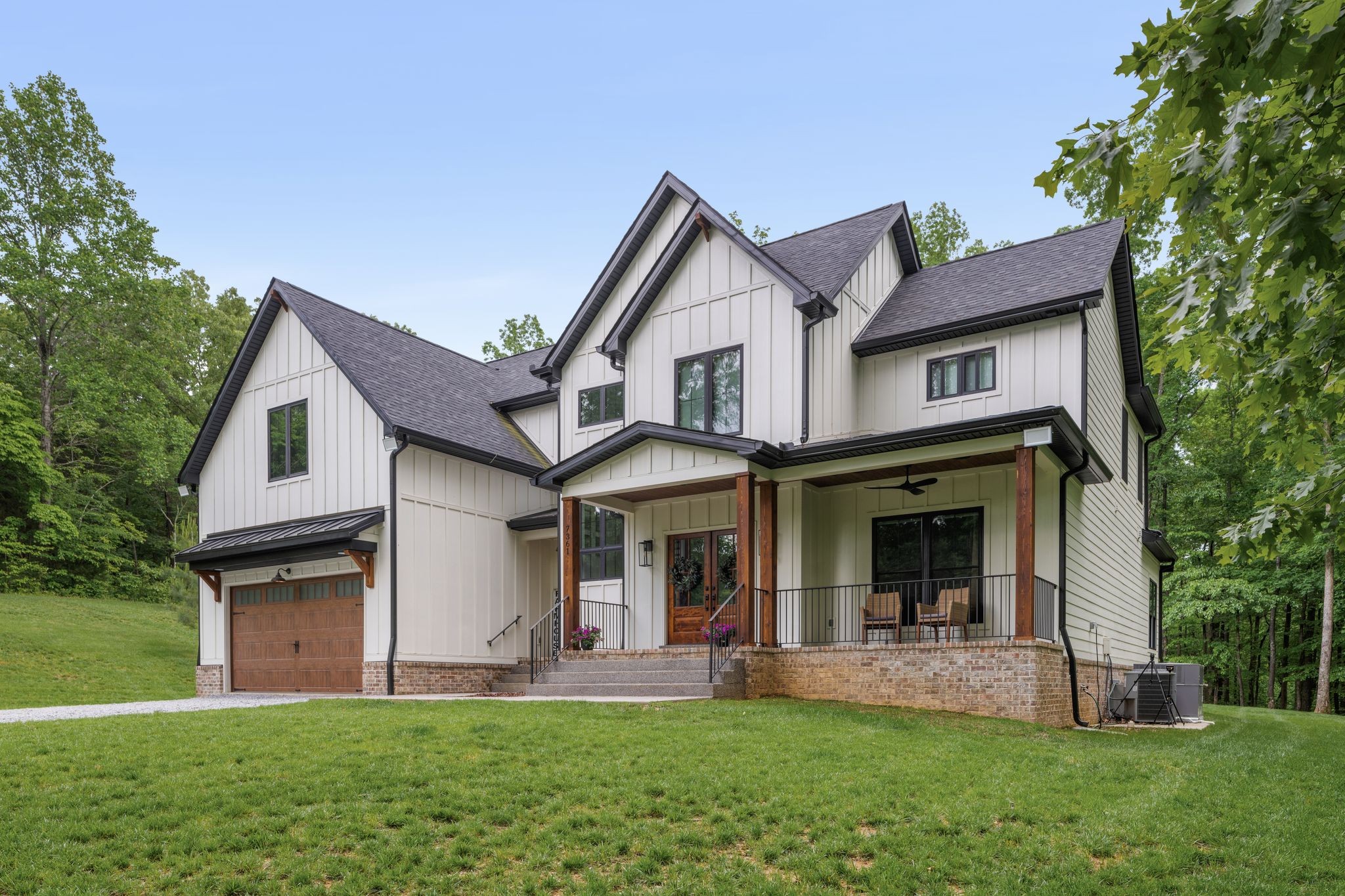 7361 Liberty Road Fairview, TN 37062 - Photo 69 of 71 a front view of a house with a yard and porch