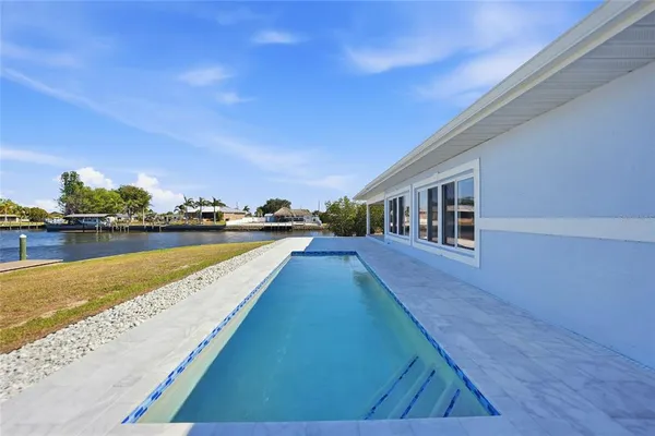a view of an swimming pool and an outdoor space
