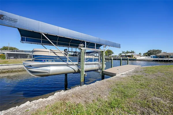 a view of a swimming pool with a lake view