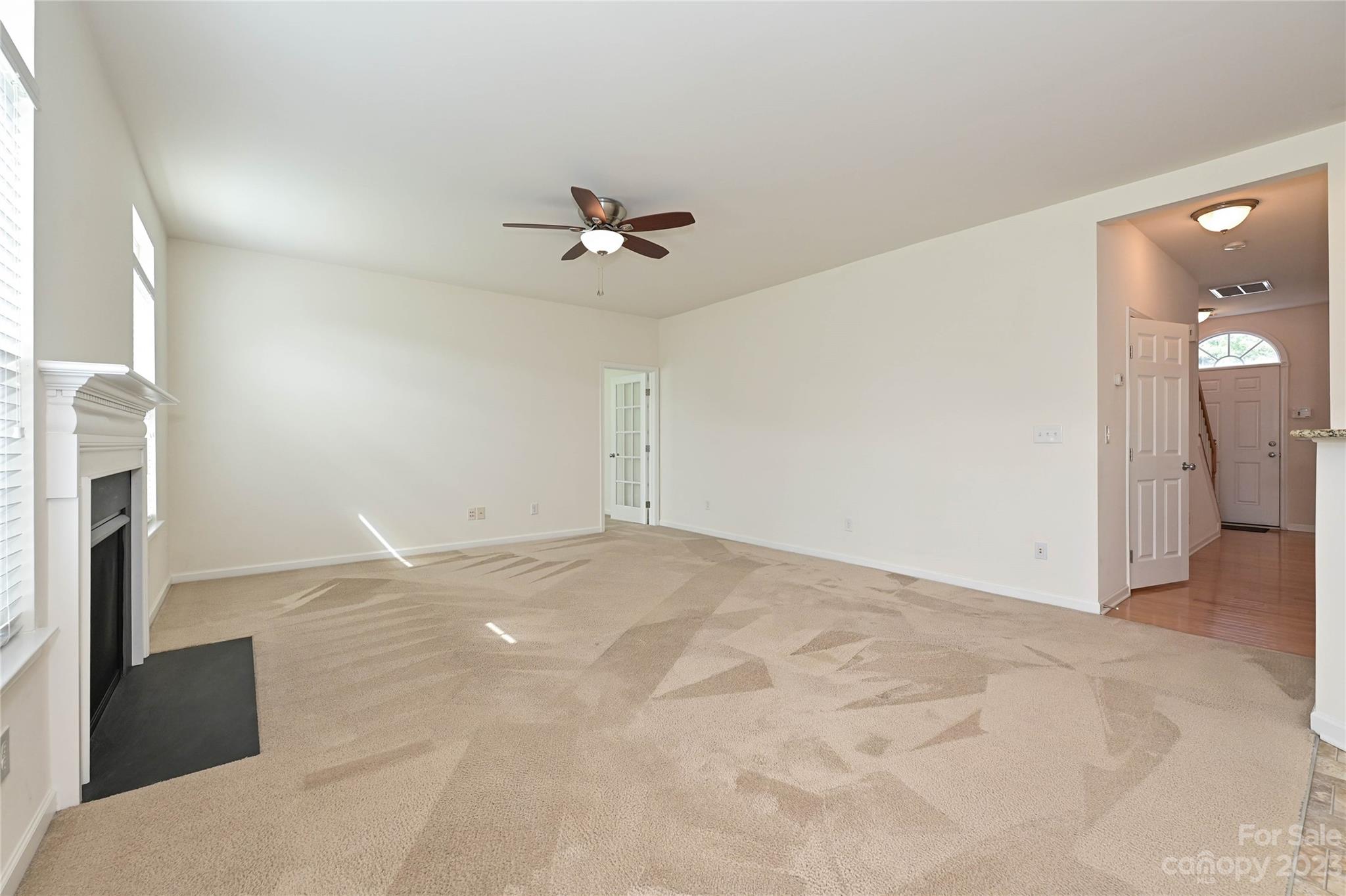 530 White Springs Road, Unit 21 Fort Mill, SC 29708 - Photo 19 of 42 a view of an empty room with a fireplace