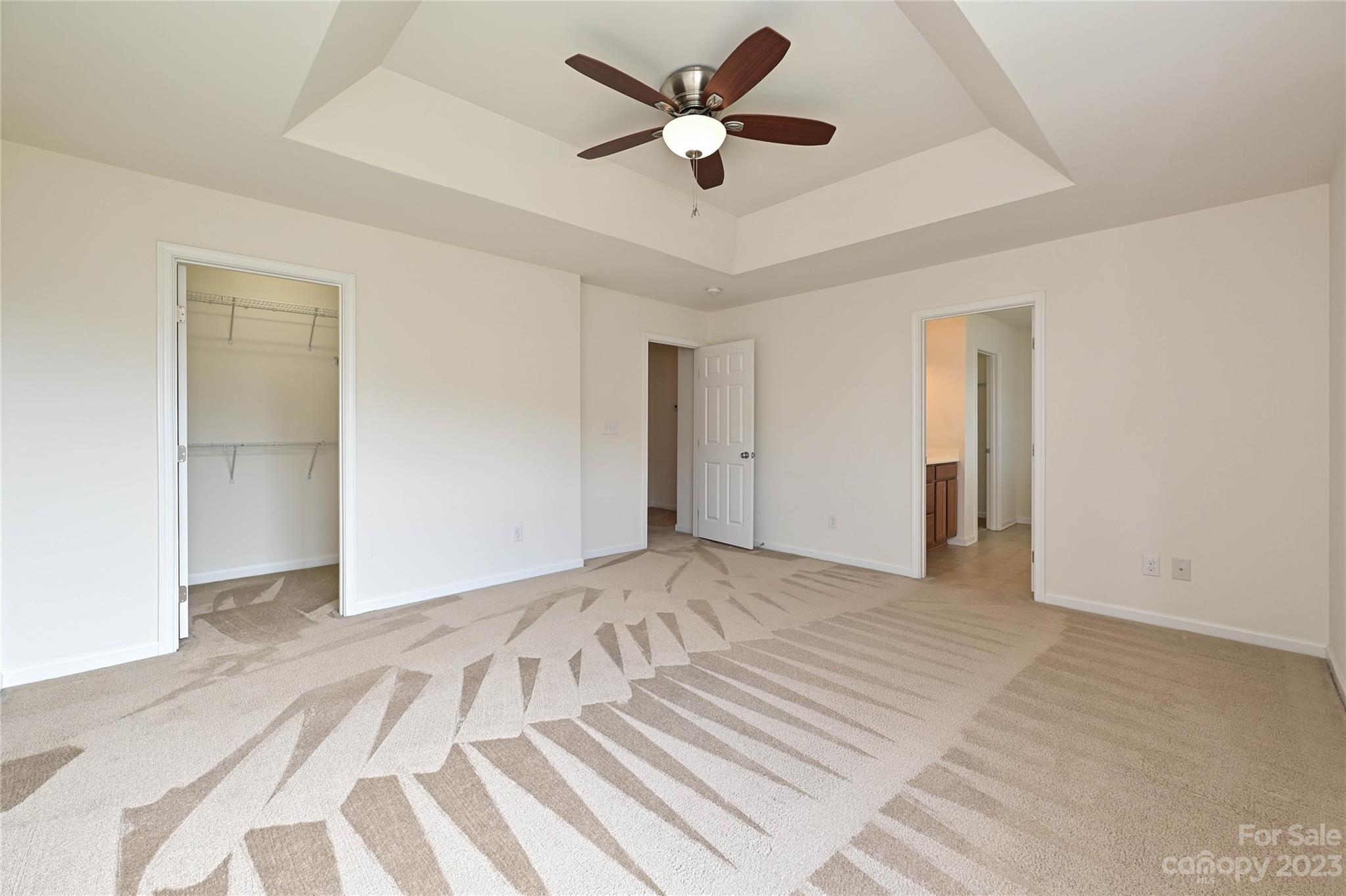 530 White Springs Road, Unit 21 Fort Mill, SC 29708 - Photo 29 of 42 a view of a livingroom with a ceiling fan and window