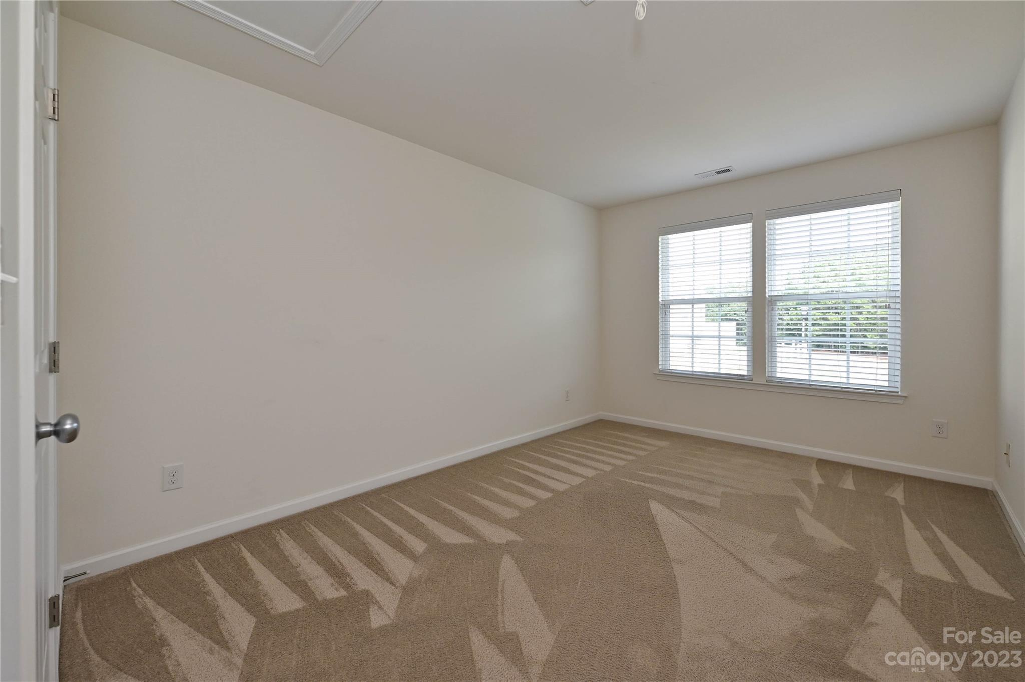 530 White Springs Road, Unit 21 Fort Mill, SC 29708 - Photo 34 of 42 an empty room with a window