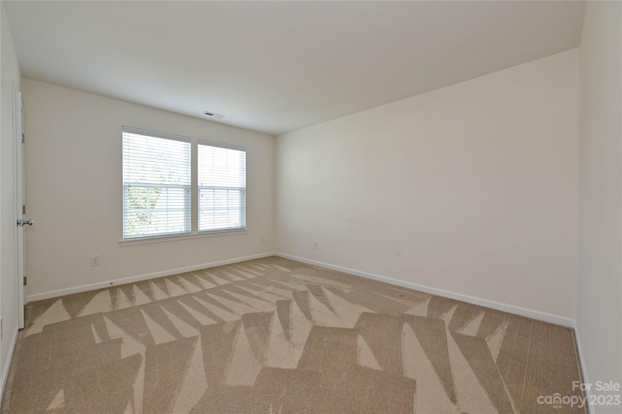 530 White Springs Road, Unit 21 Fort Mill, SC 29708 - Photo 36 of 42 an empty room with windows