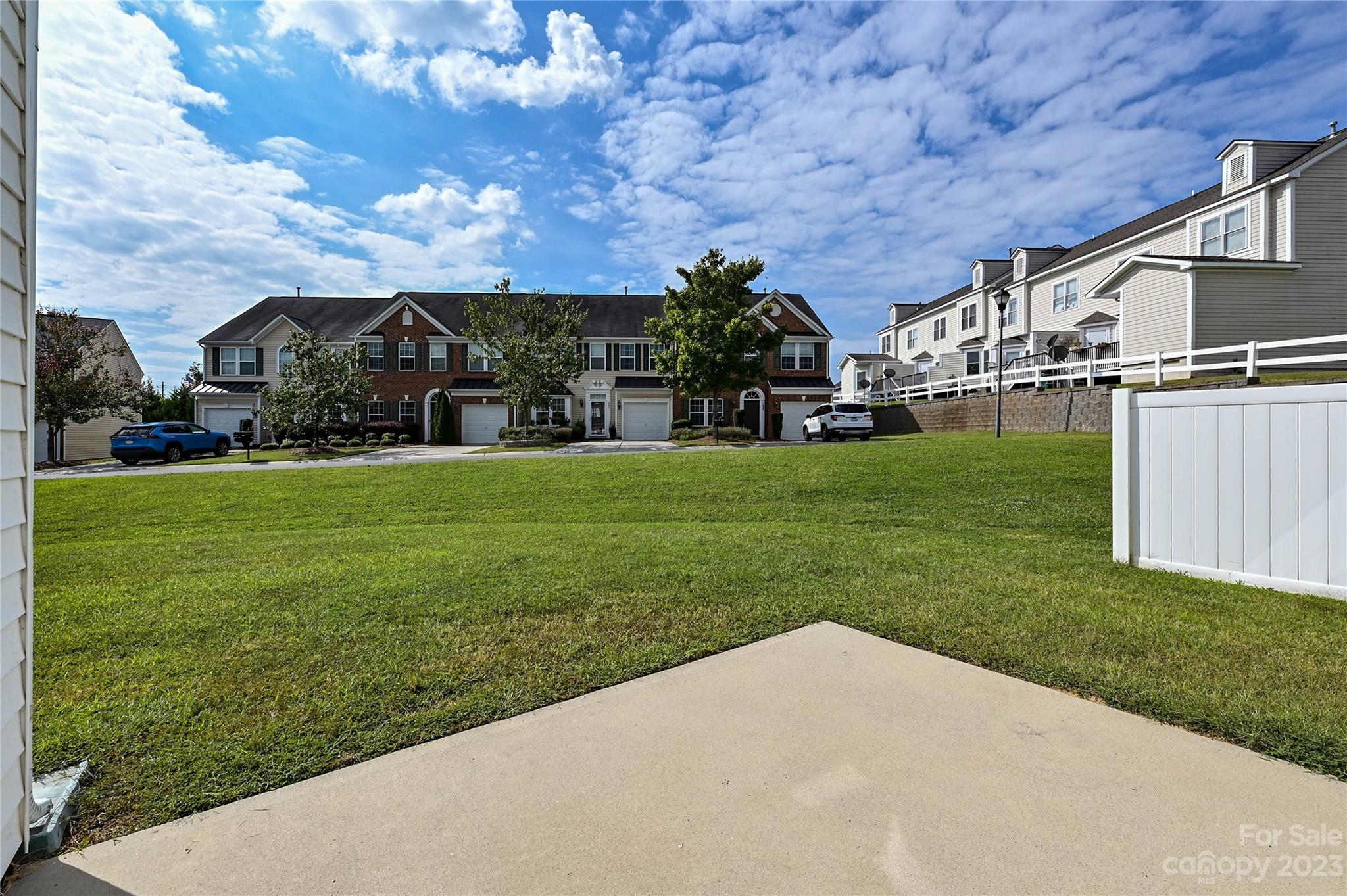 530 White Springs Road, Unit 21 Fort Mill, SC 29708 - Photo 38 of 42 a view of a big yard next to a house