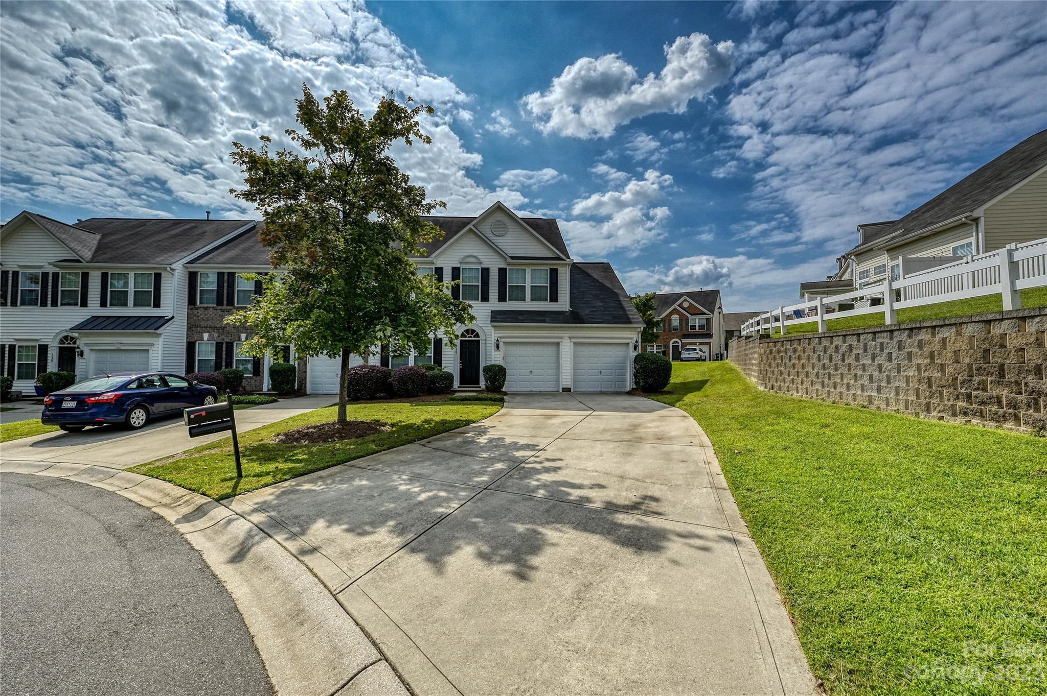 530 White Springs Road, Unit 21 Fort Mill, SC 29708 - Photo 42 of 42 a view of a house with a yard and large tree
