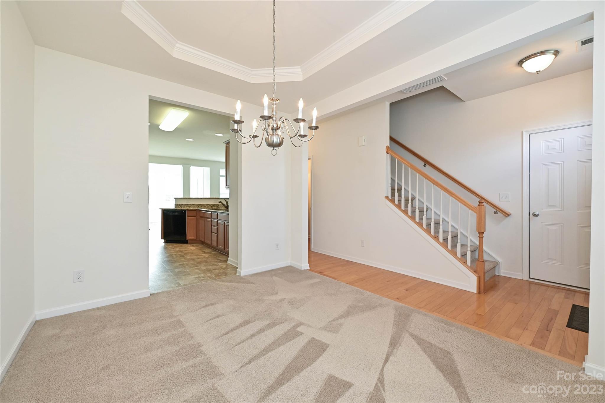 530 White Springs Road, Unit 21 Fort Mill, SC 29708 - Photo 8 of 42 a view of a hallway with wooden floor and staircase