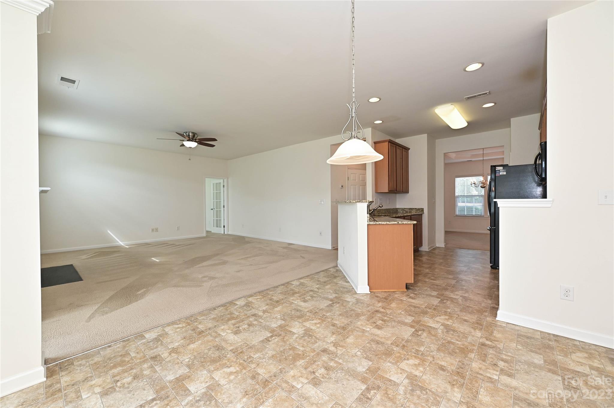 530 White Springs Road, Unit 21 Fort Mill, SC 29708 - Photo 9 of 42 a view of a kitchen with a sink and cabinets