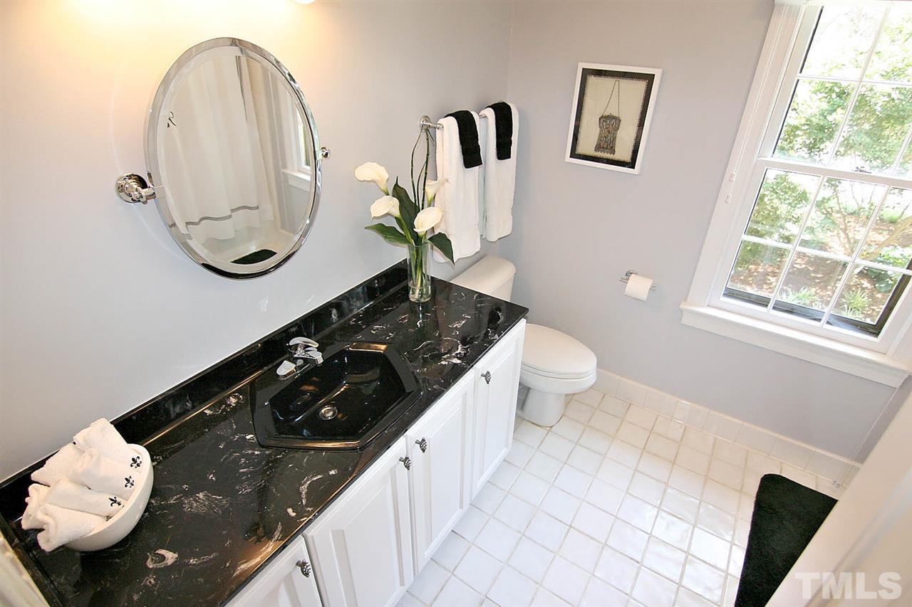8005 Shellnut Road Raleigh, NC 27615 - Photo 21 of 25 Nicely Updated and Neutral Hall Bath
