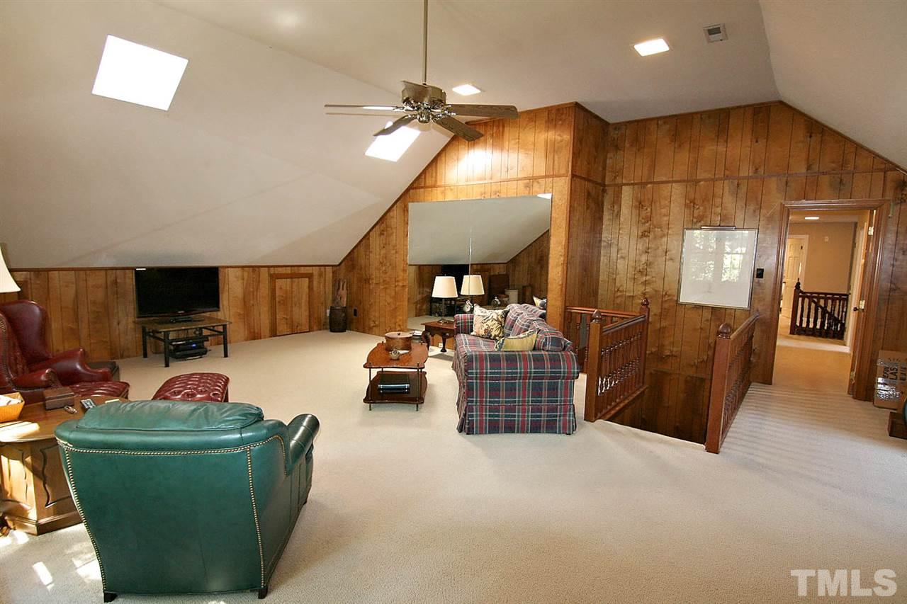 8005 Shellnut Road Raleigh, NC 27615 - Photo 22 of 25 Savor the Essence of the BEST Room for Playing -- Bonus Room has 2nd Floor Hall Access + Bonus Stairs from the 1st Floor.
