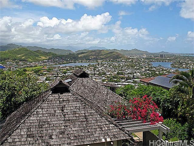 a view of city with lots of flower and trees