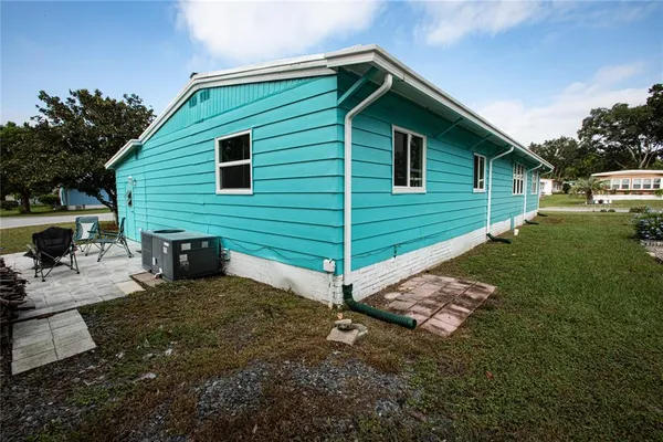a view of a backyard with a garden