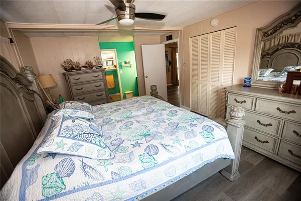 a room with sink and mirror