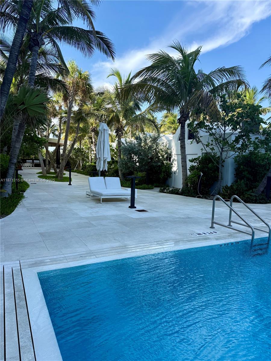 6365 Collins Avenue, Unit 904 Miami Beach, FL 33141 - Photo 30 of 35 a view of outdoor space with garden