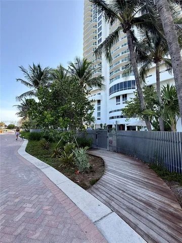 a view of a garden with pathway
