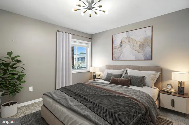 a bathroom with a sink mirror and vanity