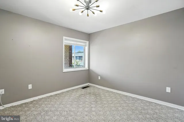 a bathroom with a shower and a toilet