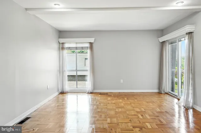 a view of a house with a small yard and plants