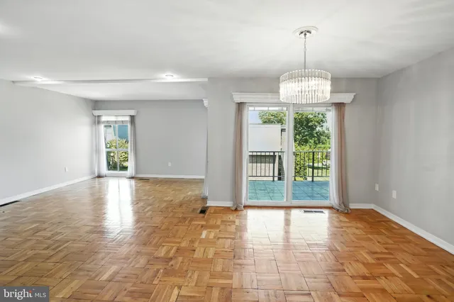 a front view of a house with a yard and a garage