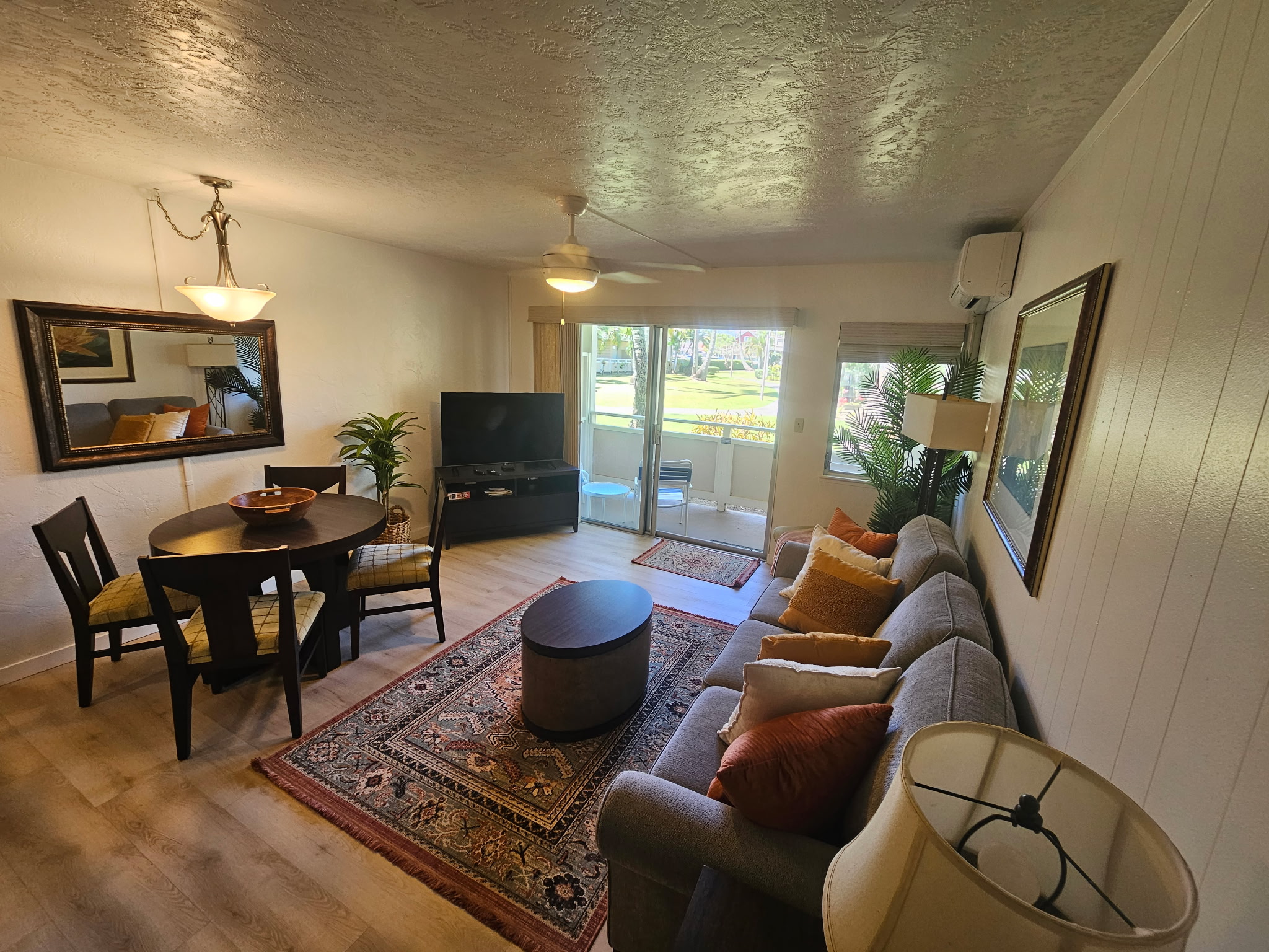 525 Aleka Loop, Unit D3 Kapaa, HI 96746 - Photo 8 of 13 a living room with furniture and a flat screen tv