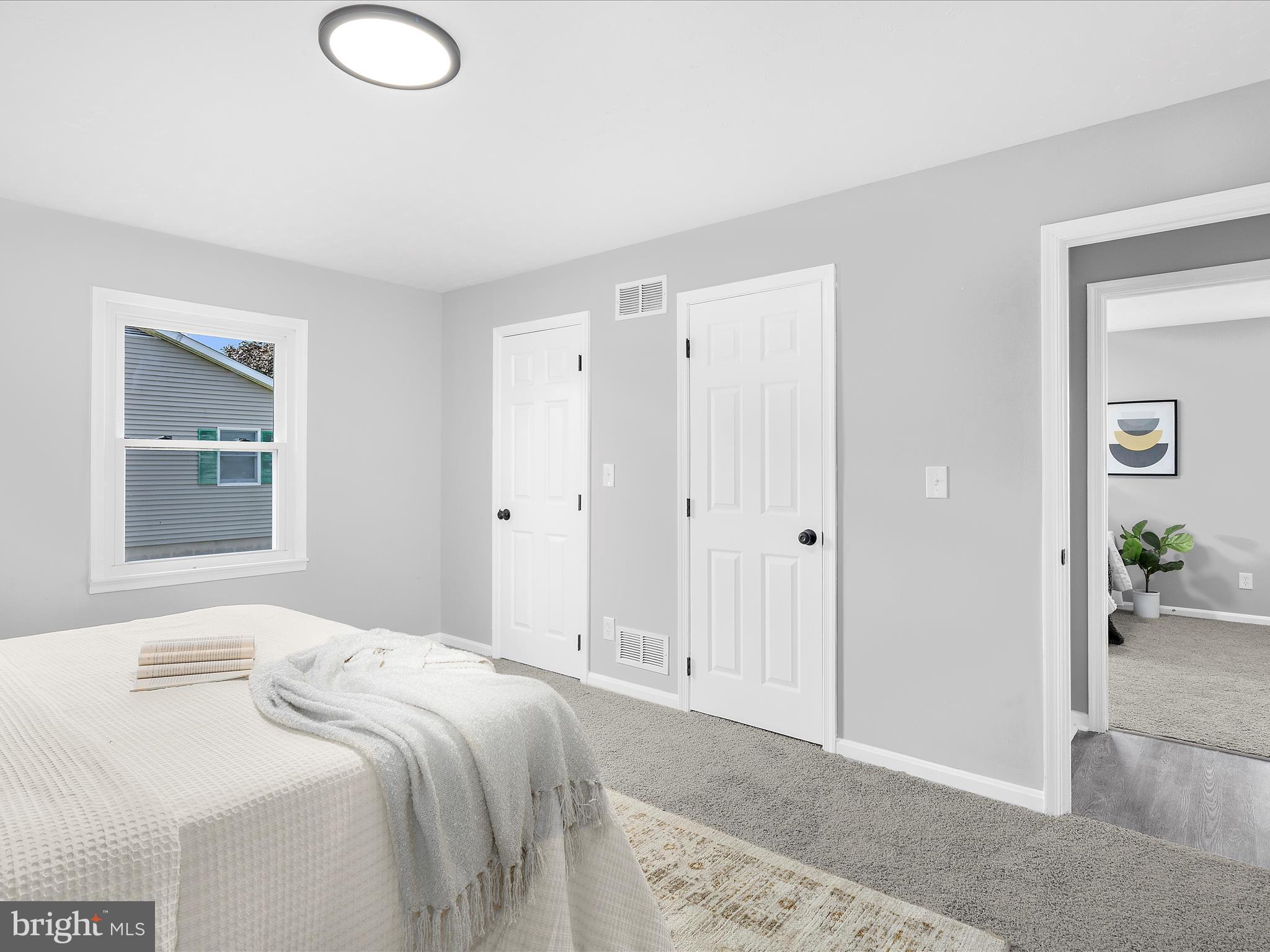 74 Ayers Drive Rising Sun, MD 21911 - Photo 13 of 41 a bedroom with a bed and a window