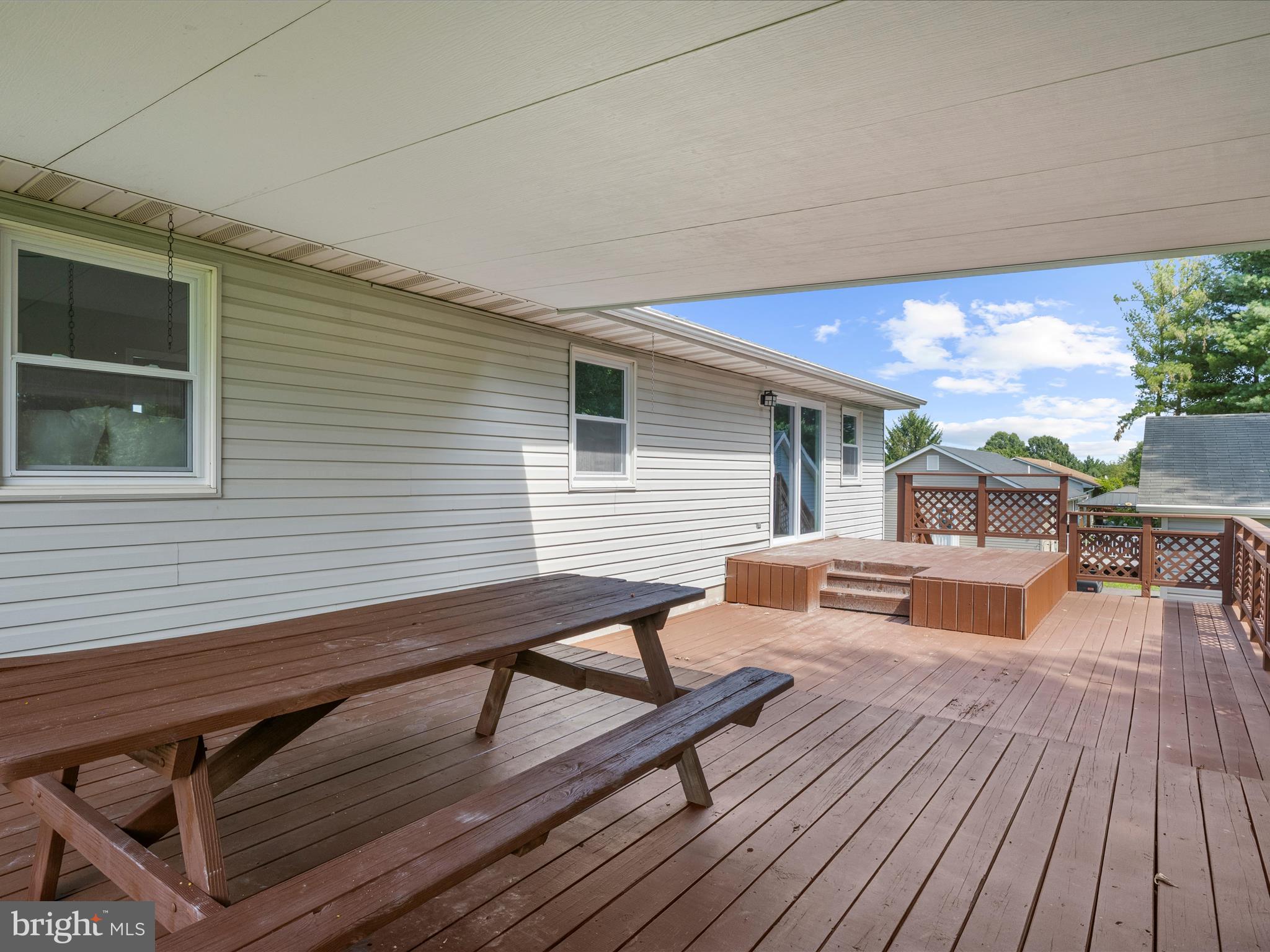 74 Ayers Drive Rising Sun, MD 21911 - Photo 35 of 41 a balcony with wooden floor and outdoor seating